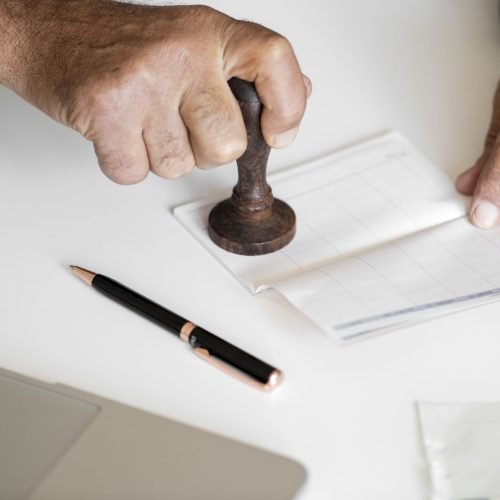 People checking bankbook isolated on white table